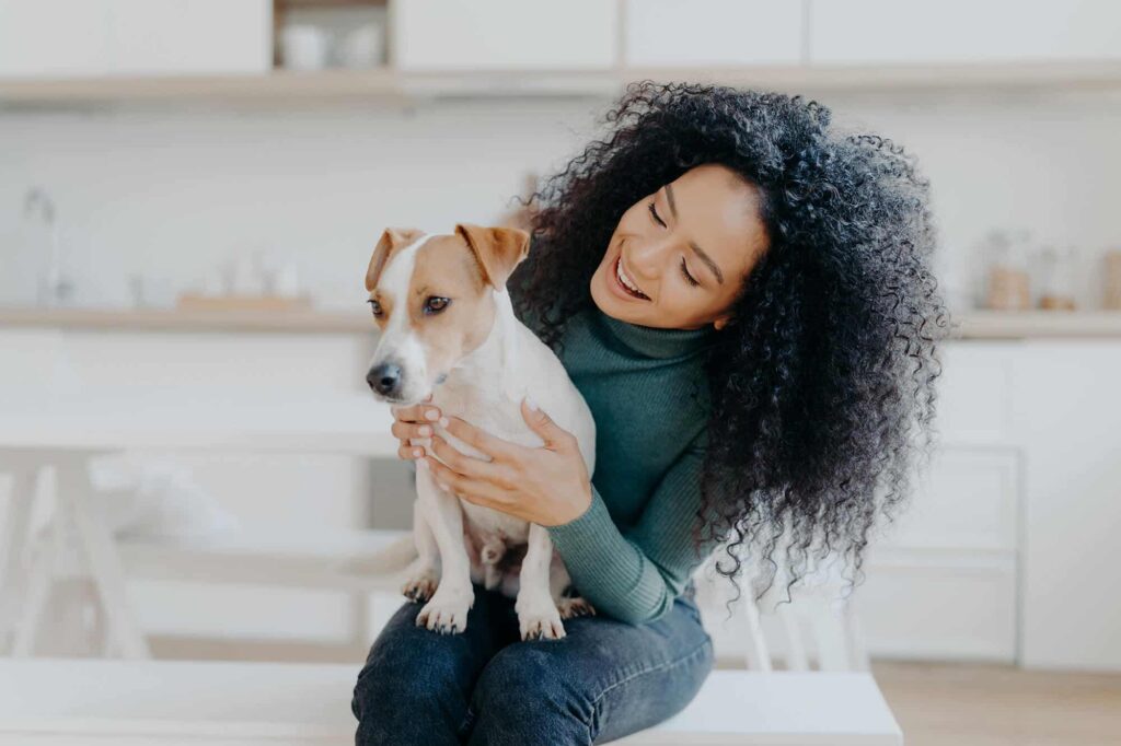 happy-female-owner-of-dog-feels-responsibility